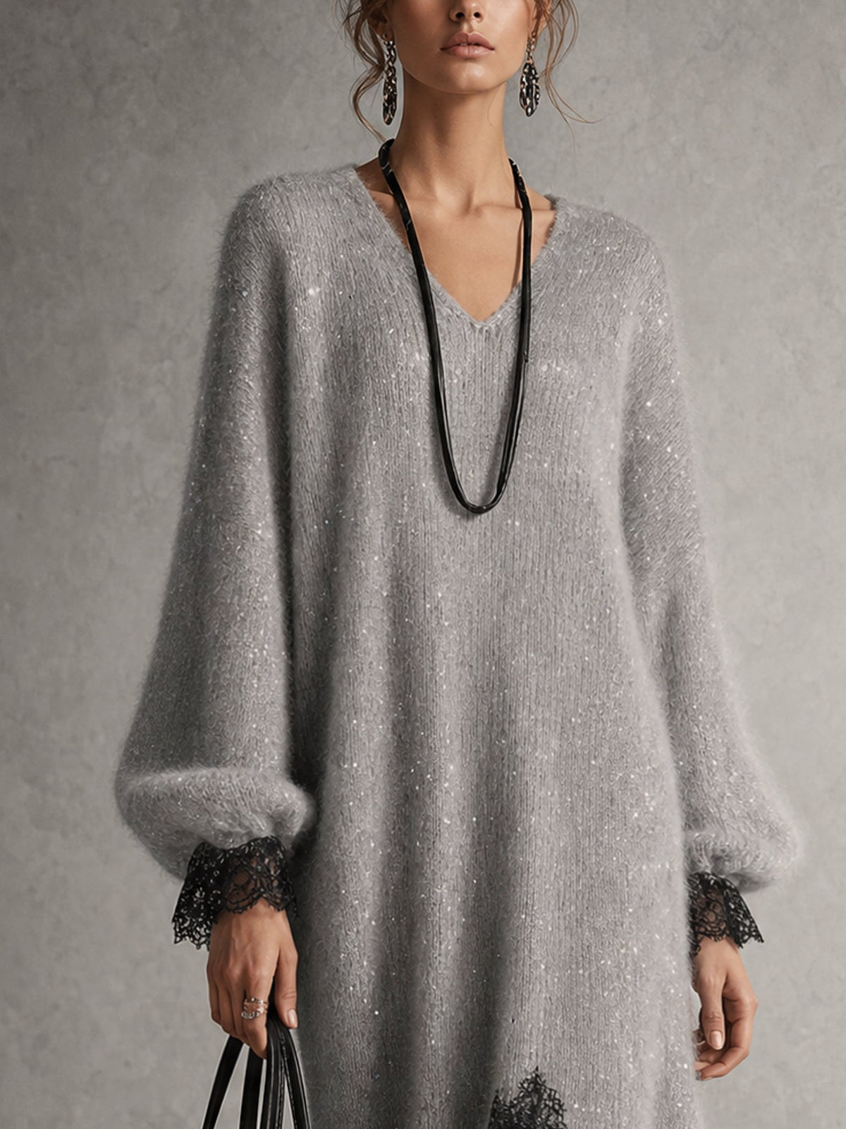 Vestido midi gris de punto con bajo de encaje